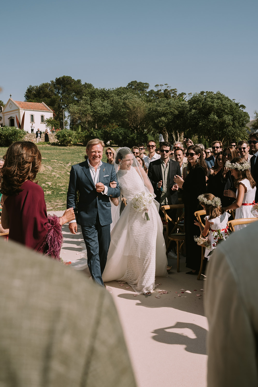 First look during walking the aisle at a wedding in Lisbon